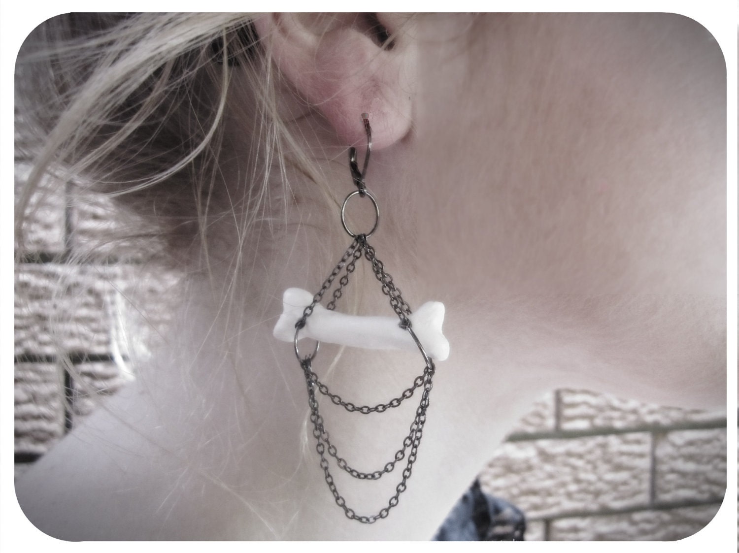 Earrings, bone shaped white ceramic with gun metal chain