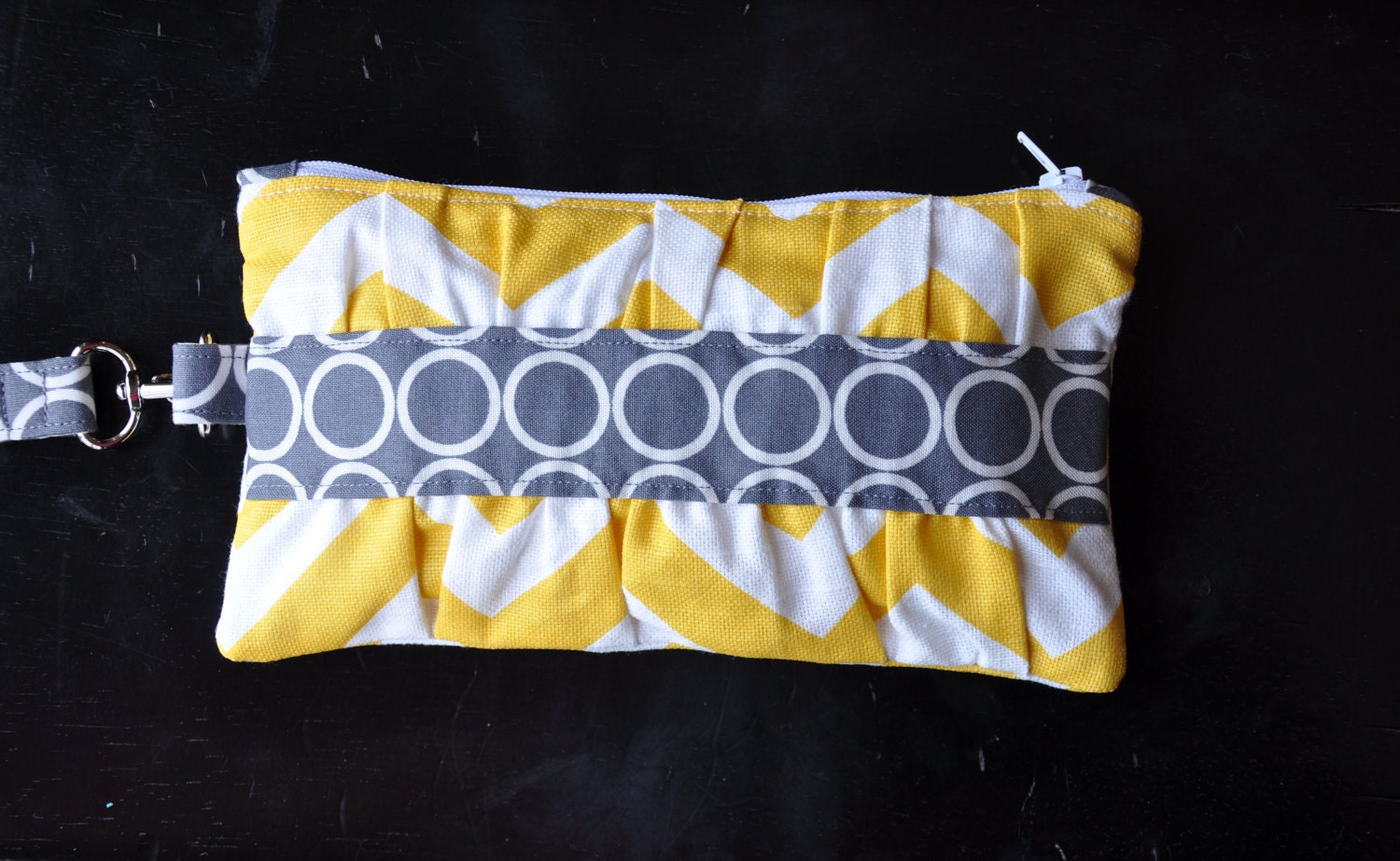 wristlet clutch with gathers and zipper, credit card pockets, removable strap