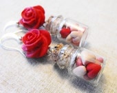 Bottled hearts earrings with a red polymer clay rose