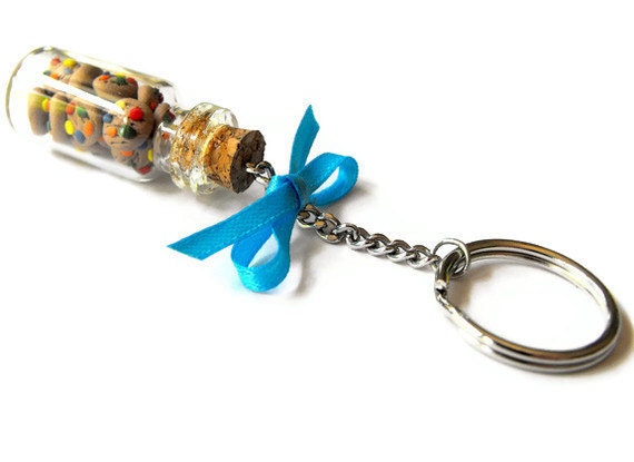 M&M chocolate chip cookie jar key chain- Miniature bottles filled with rainbow chocolate chip cookies and decorated with a blue bow