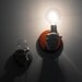 Hand Holding Bulb Wall Lamp (Red)