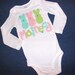 Girl or boy white onesie with 3 adorable, traditional Easter bunny marshmellow peeps applique in blue, pink, yellow, green or purple personalized with name -newborn 3m 6m 9m 12m 18m 24m white shirt sizes 12m 18m 2T 3T 4T 5T 6 7 8 10 12 14 16