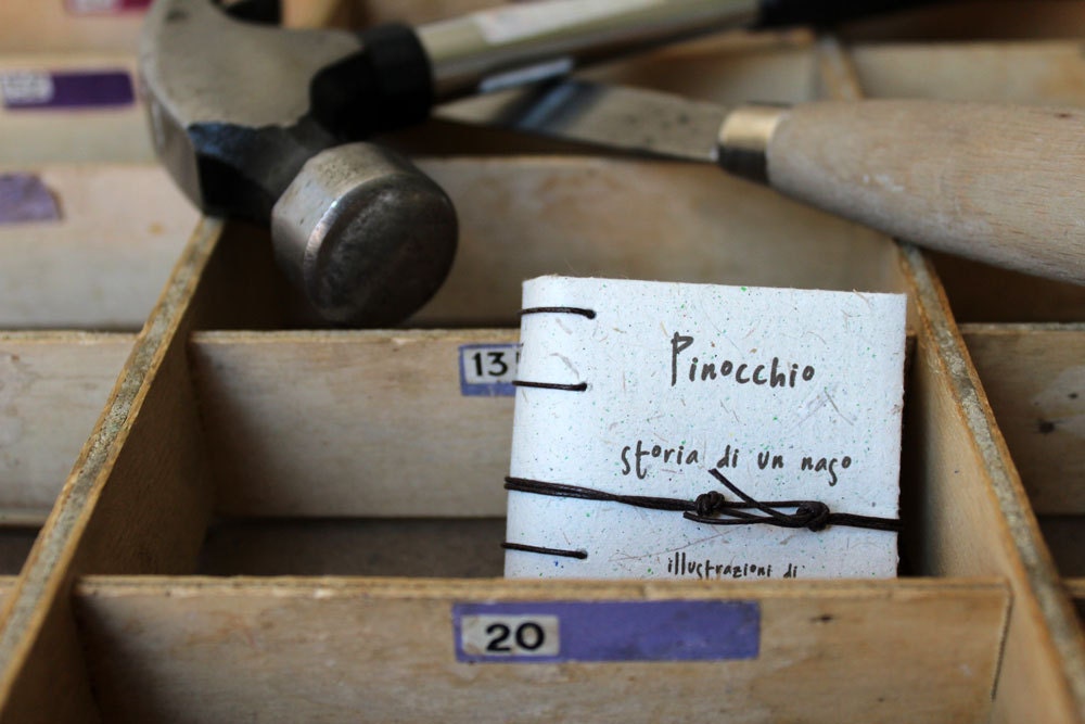 Pinocchio - The story of a nose - mini book in elephant dung paper