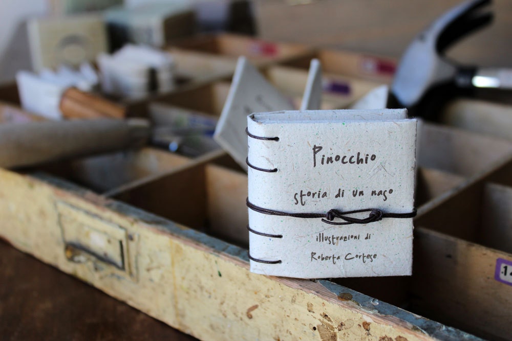 Pinocchio - The story of a nose - mini book in elephant dung paper