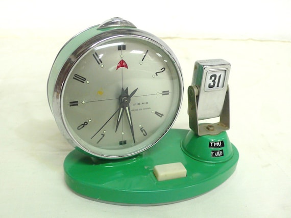 vintage alarm clock with date aqua blue color