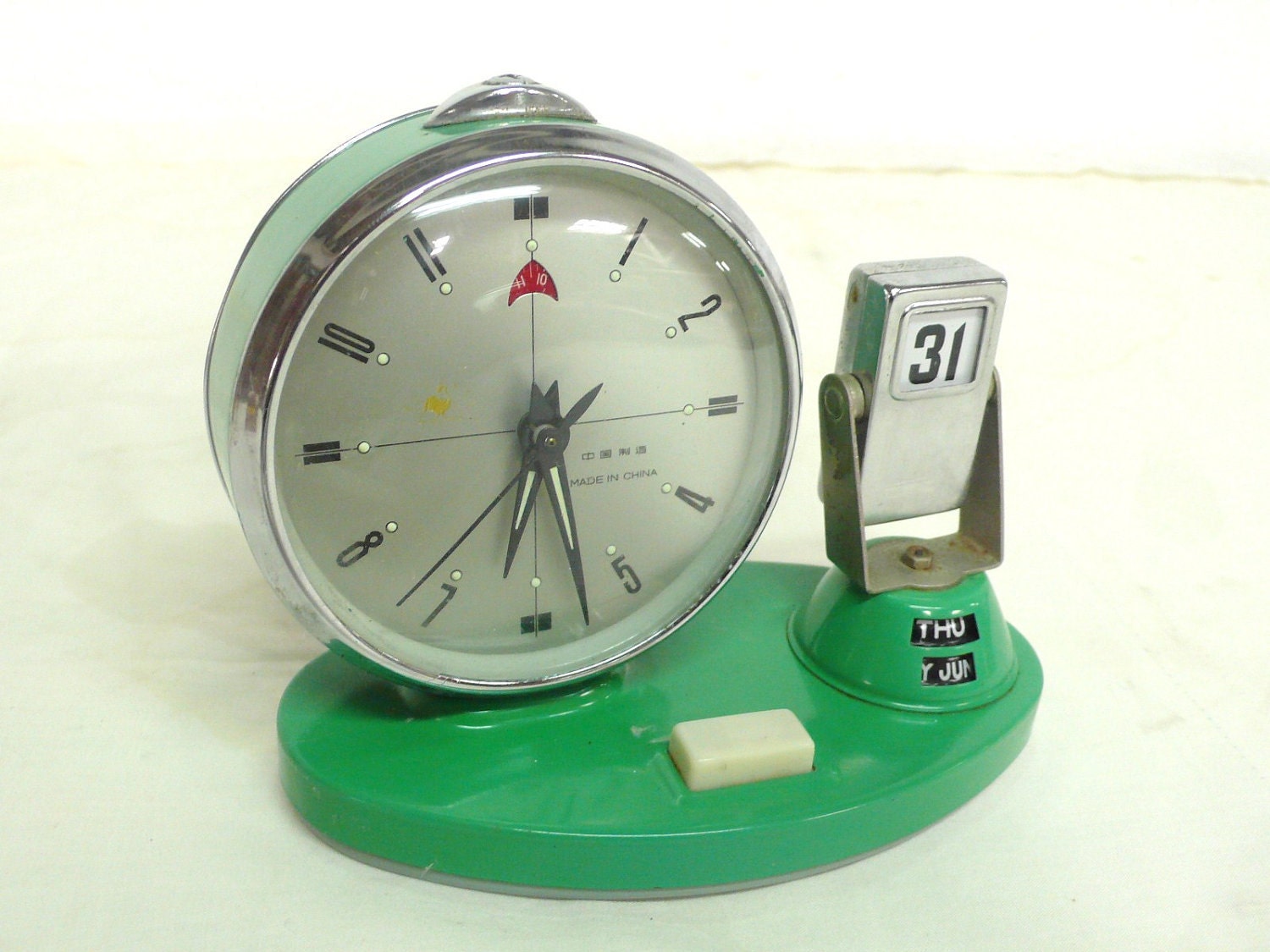 vintage alarm clock with date aqua blue color
