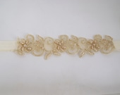 ivory garter with goldish beaded lace