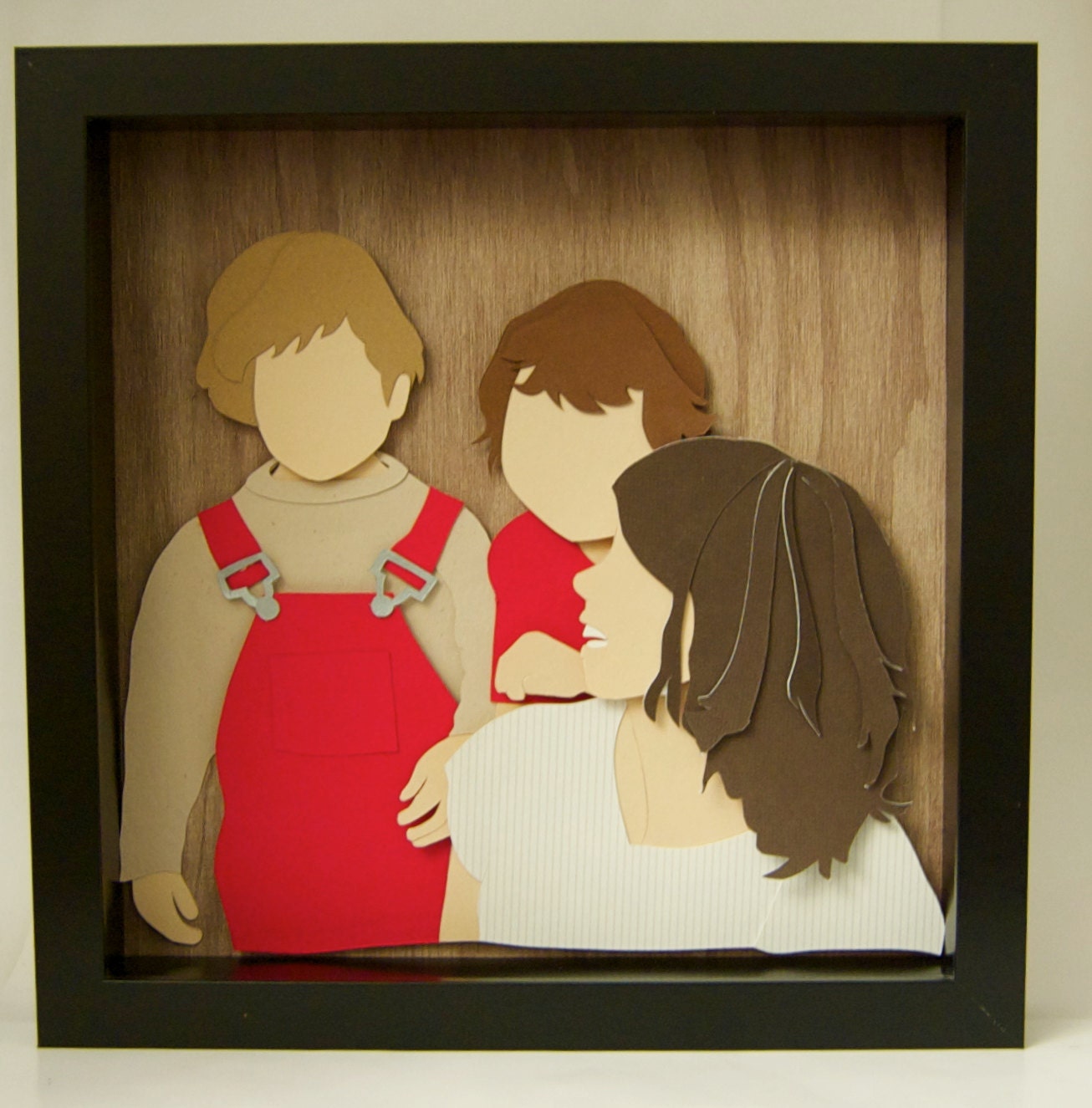 Custom cut paper child and family portrait