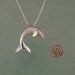 small silver dolphin pendant