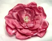 Pink fabric flower hair clip in rose with pearl accents. Ultra feminine.