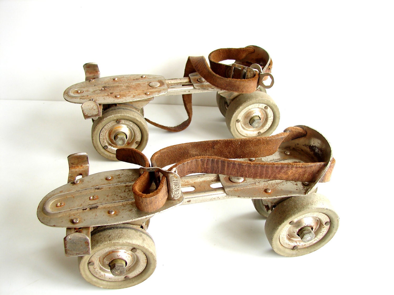 Vintage Adjustable Metal Roller Skates with Leather Straps - Collectible, Home Decor, Bookends, Plant Holder, and more