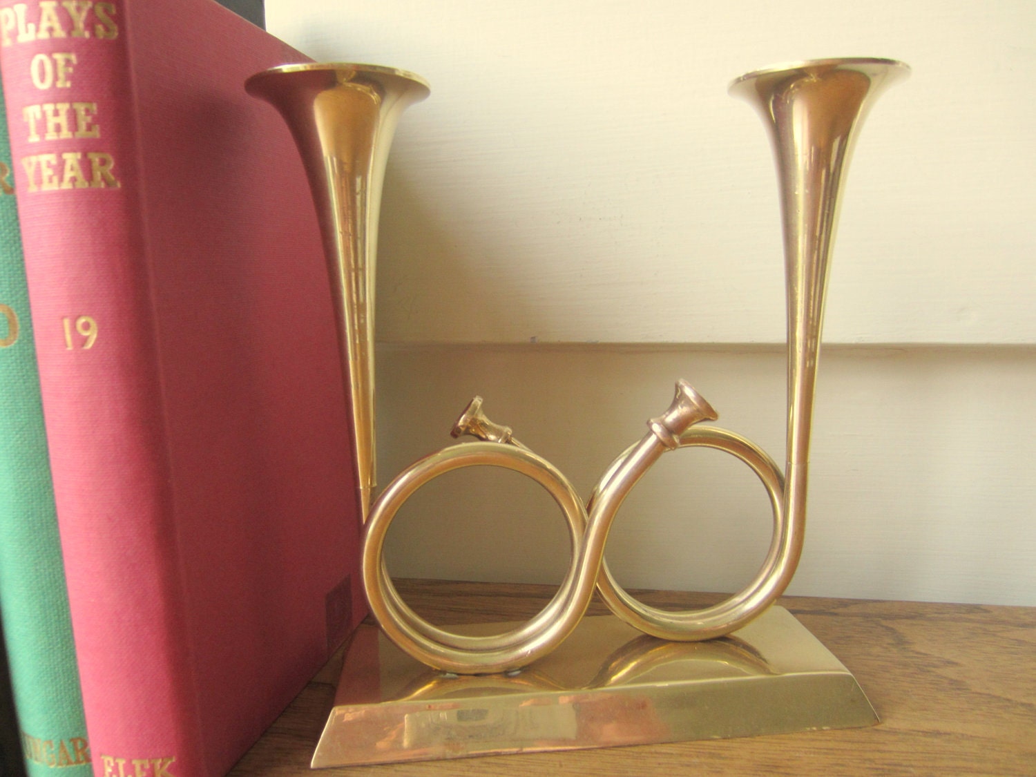 Brass horn dual candle holder.