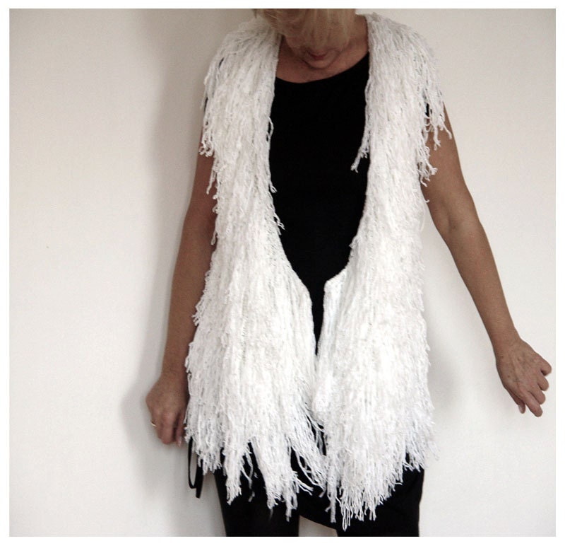 Sleeveless Fringe Jacket in White.