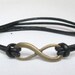 Antique Gold Infinity Bracelet with Black Leather Cord