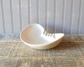 Mid Century kidney shaped hand sculpted ceramic ashtray, circa 1964