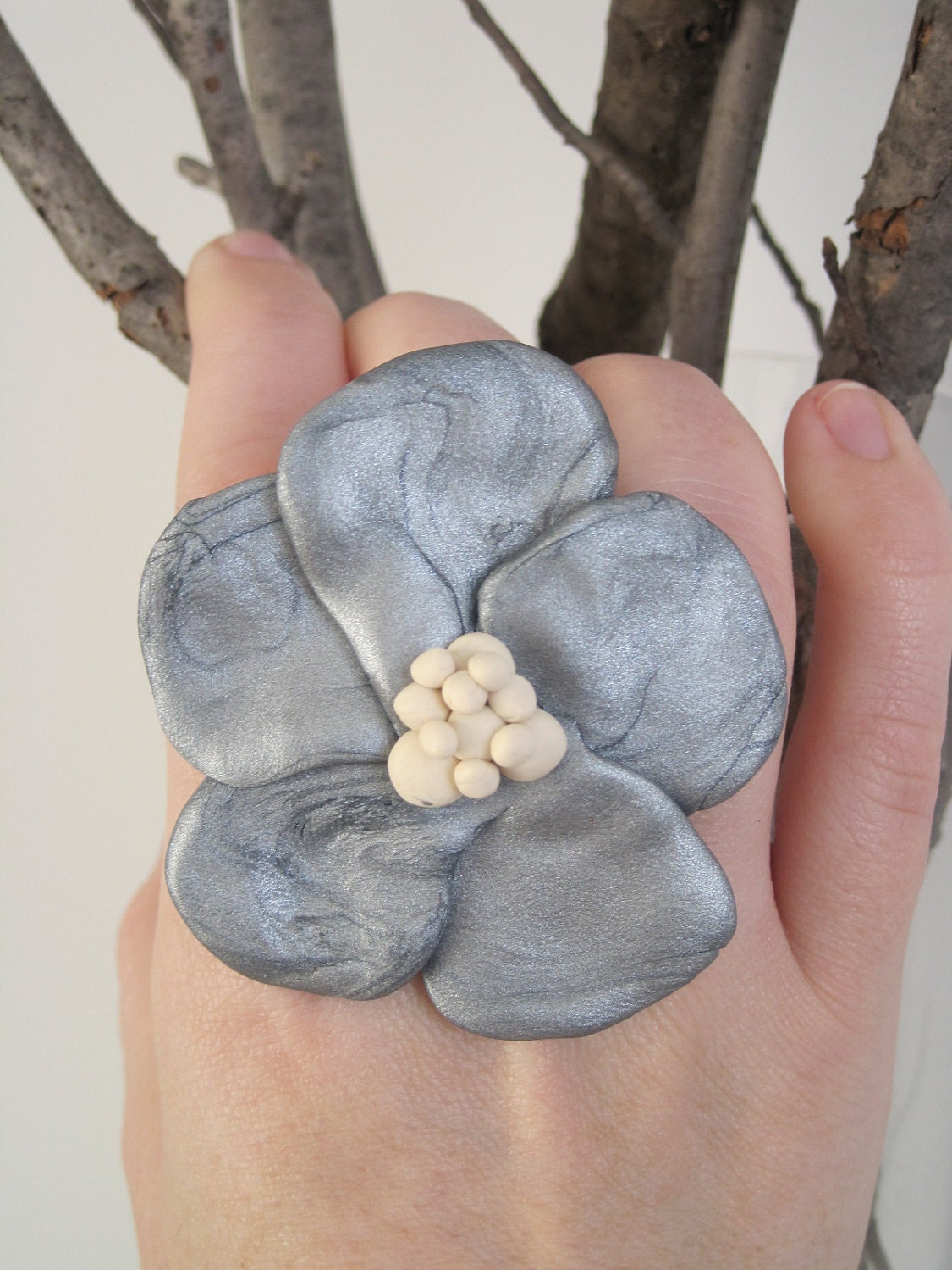 Silver and white pansy statement ring as created for Kim Kardashian