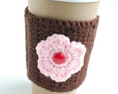 Brown coffee cozy with pink flower by The Cozy Project