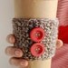 Natural coffee cozy with red wooden buttons by The Cozy Project