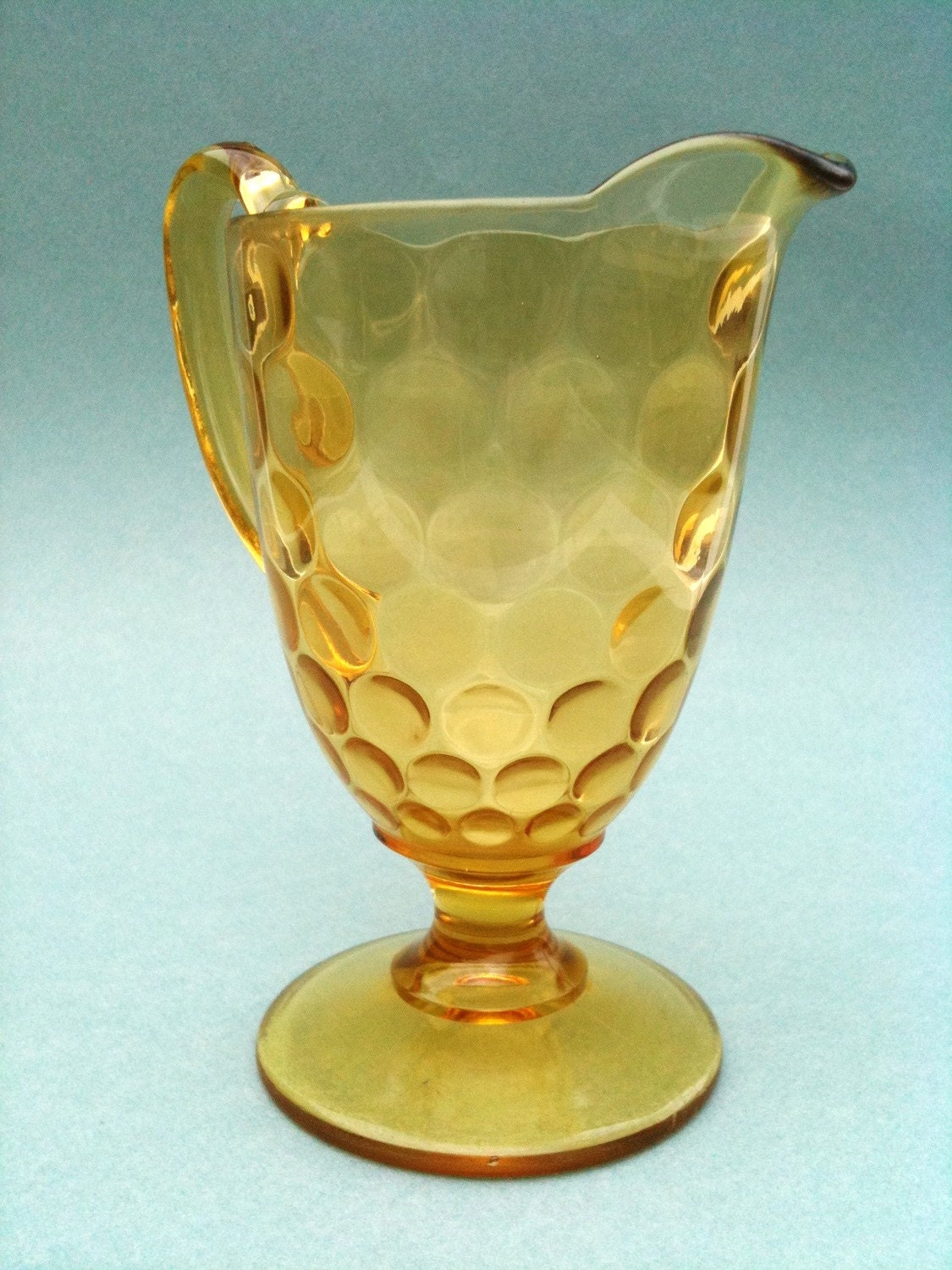 Amber Glass Thumbprint Style Pitcher.