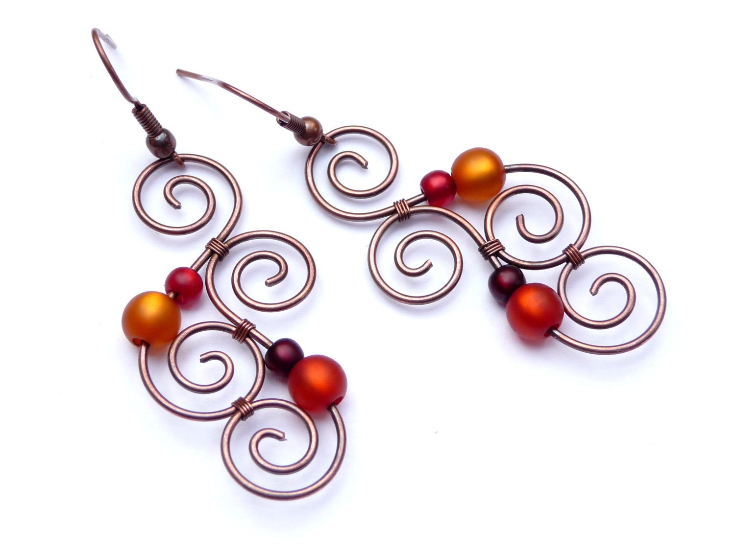 Earrings - Aotearoa - Copper & Polarisbeads ORANGE and RED - New Zealand Maori Symbols plafully wrapped out of oxidized copper wire