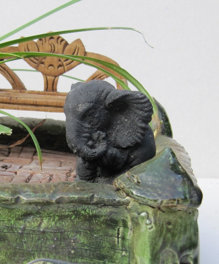 Little black stone elephant
