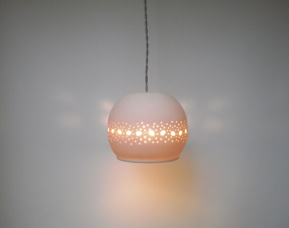 Small porcelain ball with lace