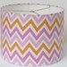 Small Drum Lamp Shade in a Pink and Orange Chevron / Zigzag Fabric.