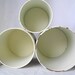 Vintage French white metal canisters.