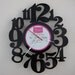 vinyl record clock (artist is Pete Fountain)