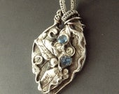 Aquamarine CZ and Fine Silver Sculpted Woodland Fairy Amulet
