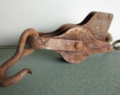 Vintage large rusty double pulley and hook