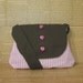 Pink and white striped sling bag with olive accents.