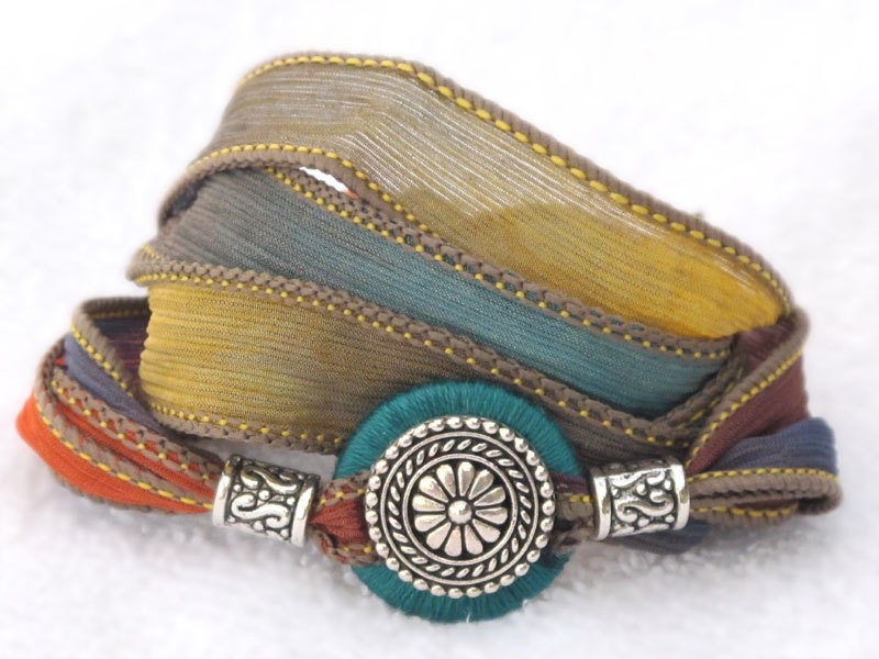 Silk Ribbon Whirly Wrap Bracelet southwest colors of sand turquoise sunset and gold with silver focal piece refined elegant desert colors
