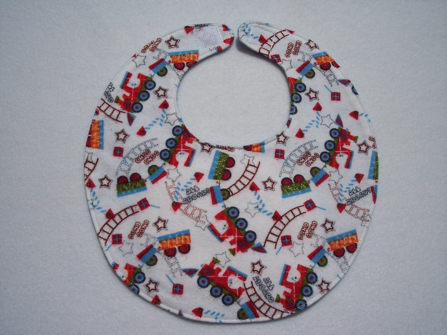 Baby Bibs, four soft layers, reversible, white with red & blue trains