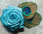 Light turquoise - light blue ribbon rose hair flower fascinator with peacock feathers