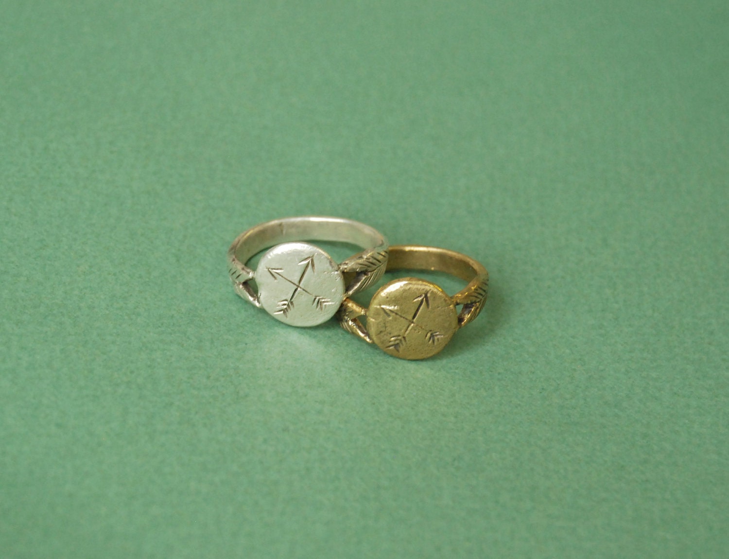 Silver crossed arrows signet ring