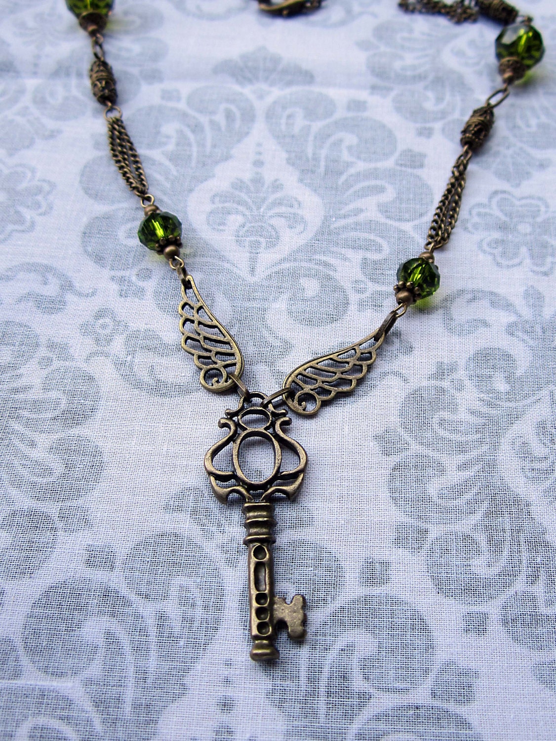 Winged Key  in Dark Green and Antiqued Brass