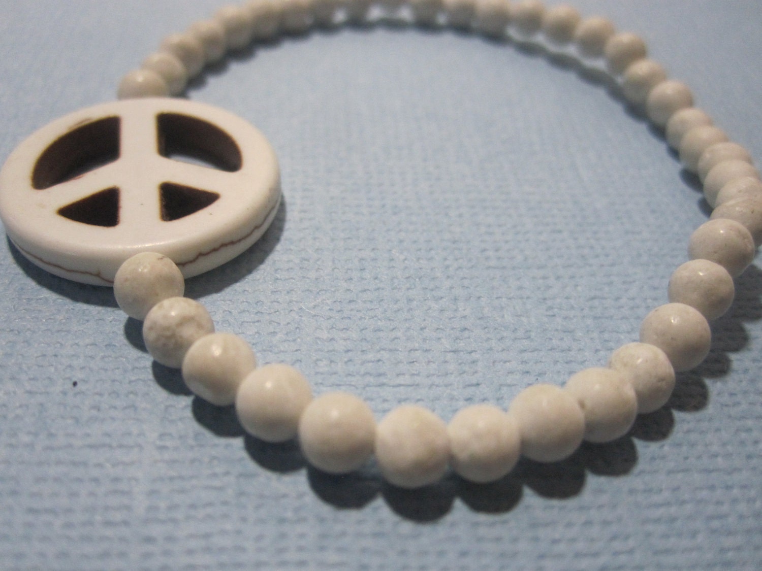 Peace On Earth Tiny White Bead Bracelet