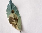 Himalayan strawberry tree leaf brooch printed with photograph 'The taxi driver'