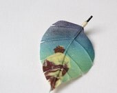 Leaf brooch printed with photograph 'Cabdriver'