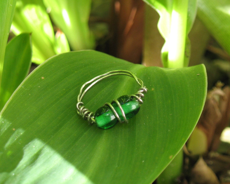 Green glass bead, double wrapped silver wire ring, size 6