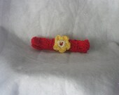 Lovely Red Knitted Baby Headband with a Small Unique Yellow and White Flower.