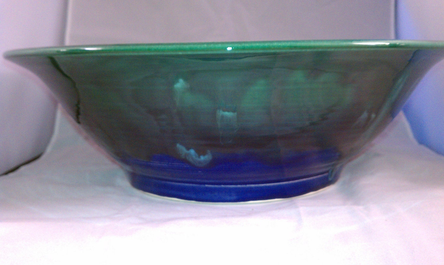 Large electic blue and emerald green bowl with glaze crystals