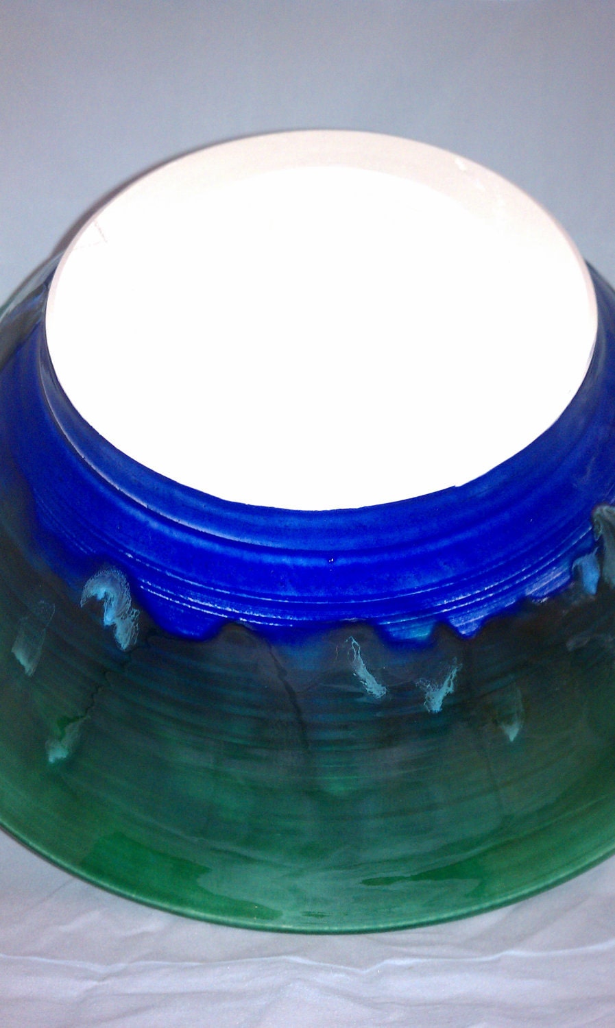 Large electic blue and emerald green bowl with glaze crystals