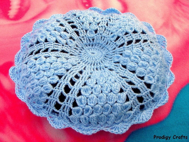Crocheted hand-made blue pillow case