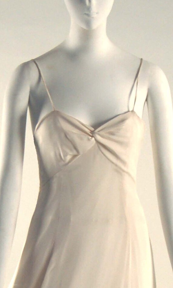 Ivory/White silk georgette classic wedding gown with twisted knot decolletage and back
