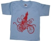 Kids Squid Riding A Bike T Shirt - American Apparel Childrens Tshirt - Sizes 2 4 6 8 10 and 12 (12 Color Options)