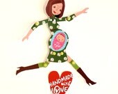 Moveable pregnant paperdoll with daisy dress. It's a girl.