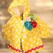 Yellow Polka Dot Infant Vinyl Coat with Fleece Lining and Beautiful Flower and Ric Rac Accents