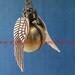Harry potter Enchanted Golden Snitch ball locket Ball necklace, locket pocket WATCH with Double Sided Silver Wings